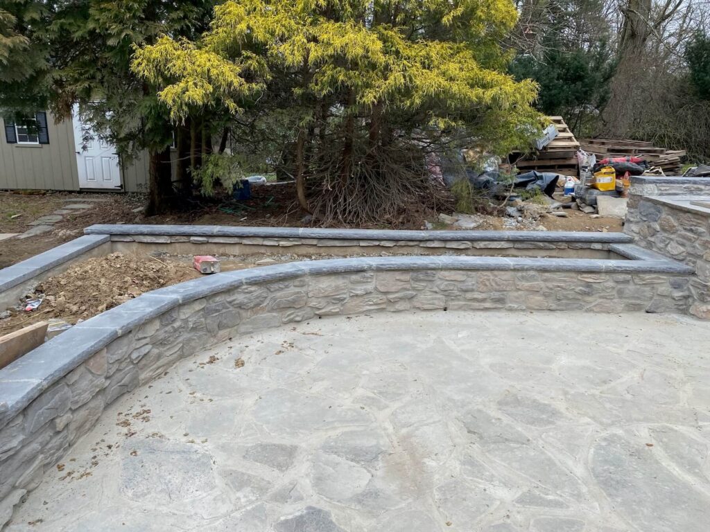 concrete back patio and stone wall concrete back patio and stone wall
